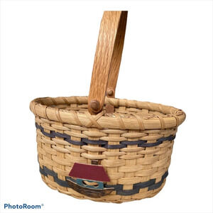 Cute handmade basket with ceramic sailboat coastal grandmother